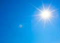 Summer background, wonderful blue sky with bright sun