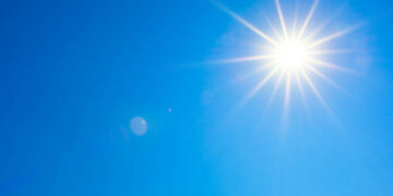 Summer background, wonderful blue sky with bright sun