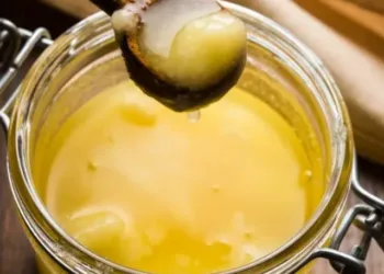 ghee-butter-in-glass-jar-with-wooden-spoon