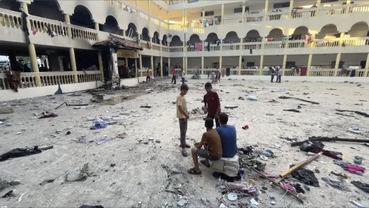 This image made from a video, shows the yard of a school after being hit by an Israeli airstrike in Gaza City Saturday, Aug. 10, 2024. (AP Photo)