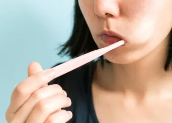 Female_Brushing_Teeth_1296x728-header-1296x729