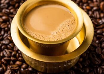 south-indian-filter-coffee-served-traditional-brass-stainless-steel-cup_466689-90123