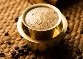 South Indian Filter coffee served in a traditional brass or stainless steel cup