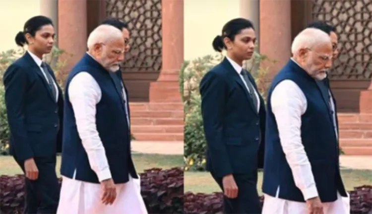 Kangana shares picture of female commando escorting PM