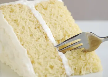 Piece of Yellow Cake with Vanilla Frosting