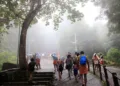 Sabarimala, India - October 21,2017 : Unidentified pilgrims walk through the forest to Sabarimala temple in Kerala, India. Sabarimala is a pilgrim centre located in the forest in Kerala.