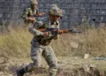 FILE - Indian army soldiers conduct a search operation in a forest area outside the Pathankot air force base in Pathankot, India, Sunday, Jan. 3, 2016. (AP Photo/Channi Anand, File)