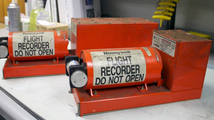 WASHINGTON, DC - JULY 7: In this handout photo provided by the National Transportation Safety Board, the Asiana Airlines flight 214 flight data recorder (L) and the cockpit voice recorder (R) are displayed in the NTSB's laboratory on July 7, 2013 in Washington, DC. The Boeing 777 passenger aircraft from Asiana Airlines coming from Seoul, South Korea crashed landed on the runway at San Francisco International Airport. Two people died and dozens were injured in the crash.  (Photo by NTSB via Getty Images)