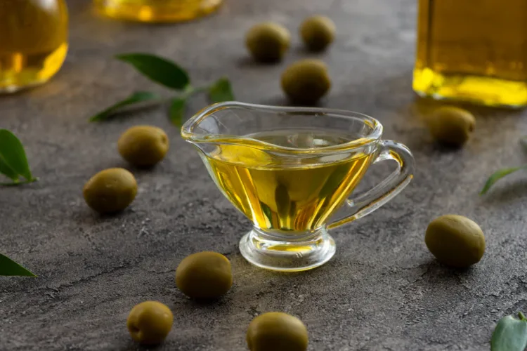 assortment-olive-oil-glass-green-olives