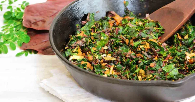 Moringa red Spinach stir fry/ Cheera Drumstick leaves Thoran, selective focus