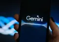Vancouver, BC, Canada - December 14, 2023: Google Gemini Logo on a Smartphone Screen on a Dark Background; Shutterstock ID 2400903317; purchase_order: -; job: -; client: -; other: -