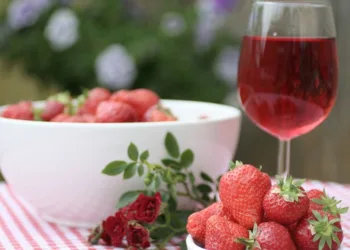 Fresh strawberries on a red and white cloth